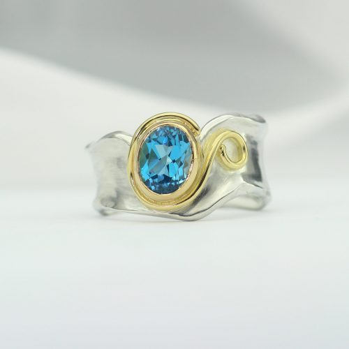 Blue Topaz Silver and Gold Origins ring
